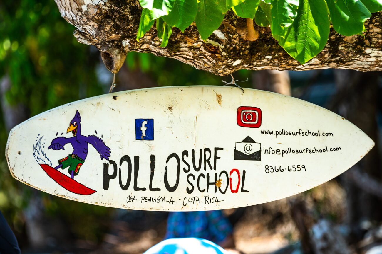 The hand-painted Pollo Surf School board sign