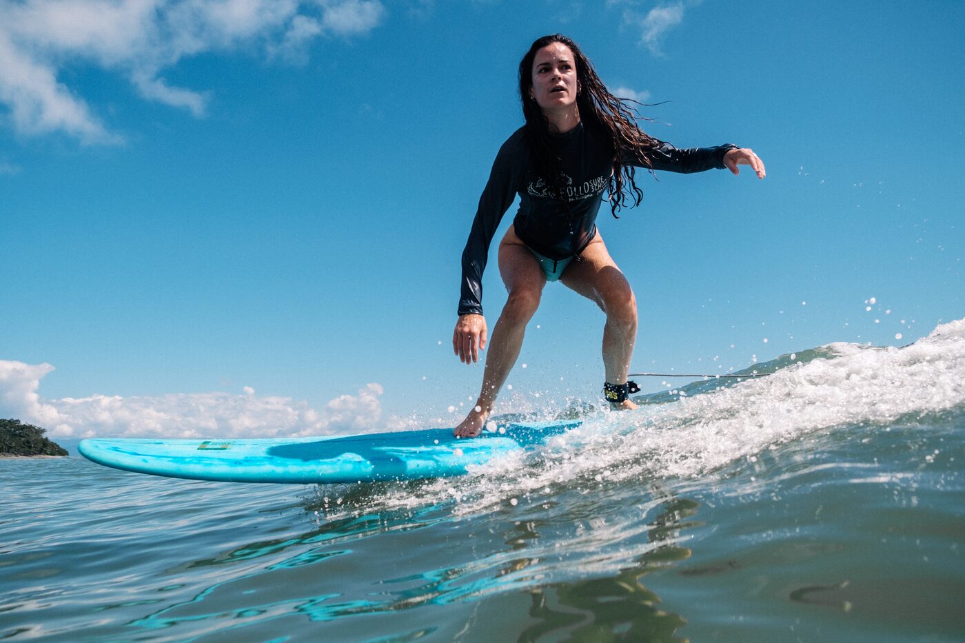 Point-of-view shot riding a turquoise wave